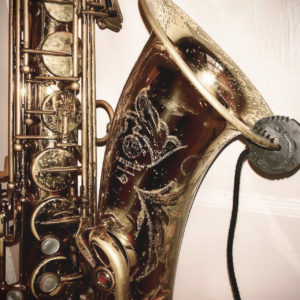 REMIC W3000 G1 mounted on saxophone, photo by REMIC Artist Matthew Alec