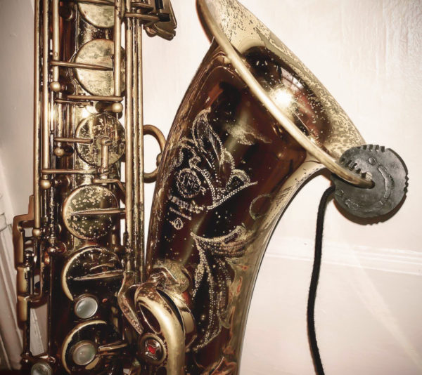 REMIC W3000 G1 mounted on saxophone, photo by REMIC Artist Matthew Alec